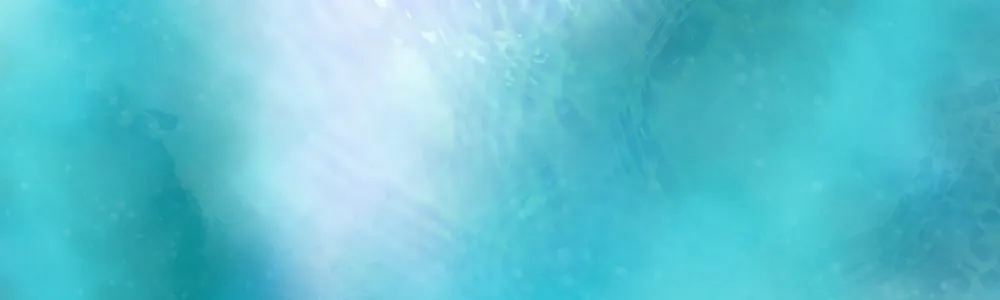 エメラルドグリーンの水面の画像
